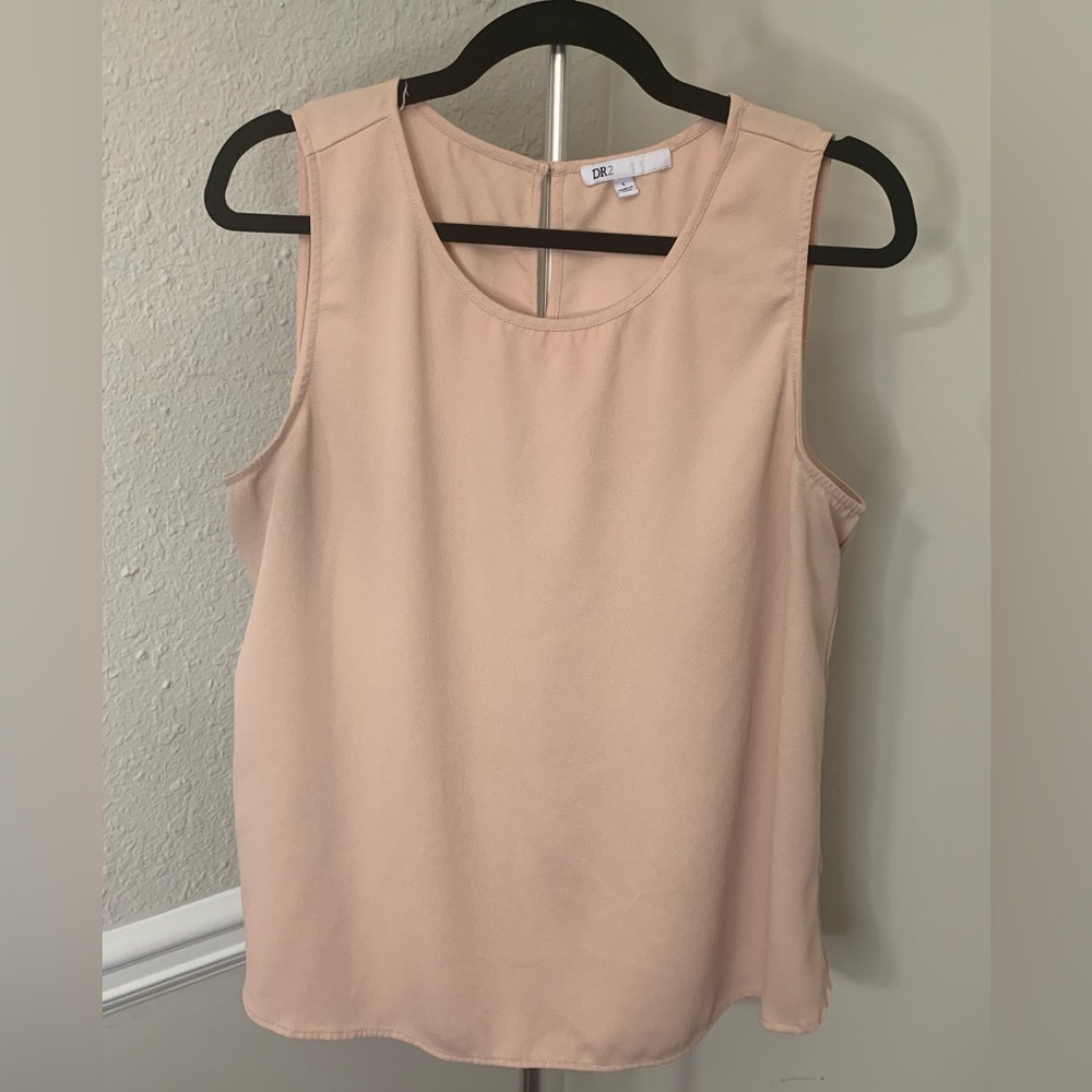 Sleeveless pink blouse